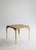 Pair of vintage mosaic-top side tables featuring earthy-tone mosaic surfaces and tapered brass legs with an aged patina....