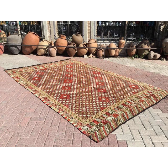 This beautiful, vintage, handwoven kilim is approximately 50 years old. It is handmade, of very fine quality hand spun...