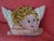 This charming decorative pillow features a meticulously crafted needlepoint golden haired angel face with wings design...