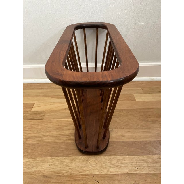 These spindle wood magazine racks were a staple in the well appointed MCM home. Styled after one by Arthur Umanoff, this...