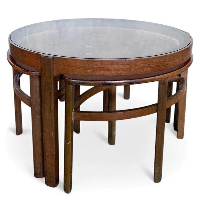 These mid century nest tables are a stunning addition to any living space, combining vintage charm with practical design...