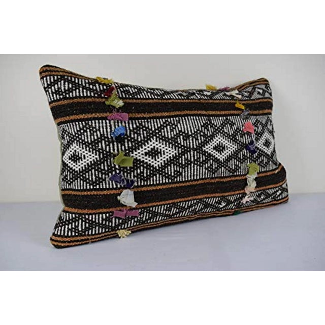 This handwoven kilim pillow is made from Anatolia and Middleast Kilim fragments. Each of our kilim pillow cover is cut...