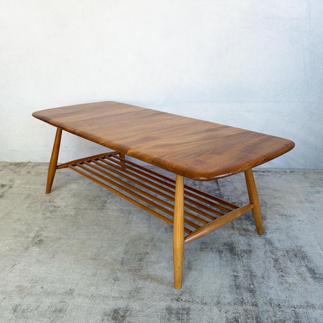 A solid elm top with rounded corners and a shaped, slightly dished edge profile, made up from several boards butt-jointed...