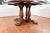 The Theodore Alexander "Castle Bromwich" Round Dining Table is a luxurious addition to any dining room. This elegant piece...