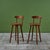 Pair of teak stools by Danish born designer Kurt Østervig for Brande Mobelindustri, c.1960s, Denmark. The stools feature a...