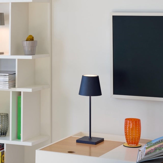 Battery-operated and rechargeable portable table lamp. The lamp features dimming touch control and has 3-CCT color...