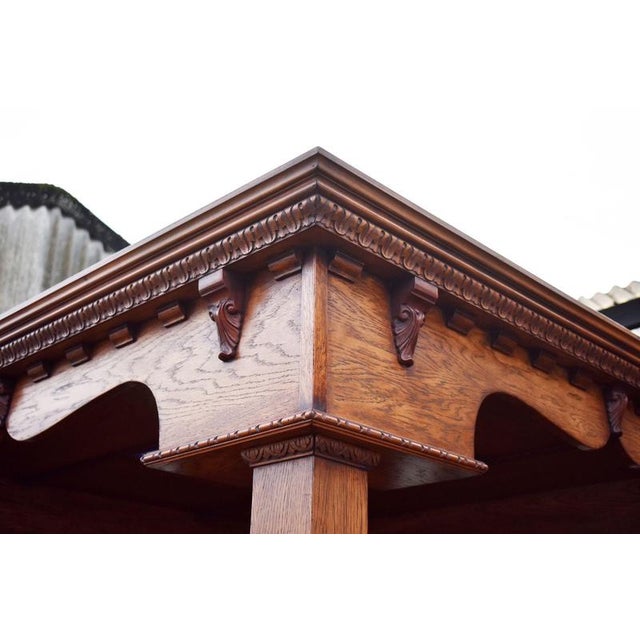 Impressive Carved Oak Bar / Sideboard with Mirrored Back A substantial and highly decorative carved oak bar, beautifully...