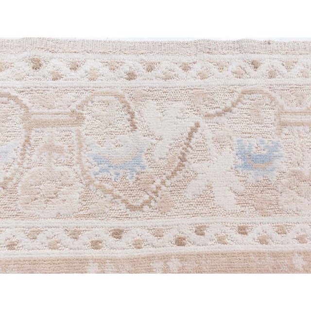 Alhambra design beige and blue handmade wool rug by Doris Leslie Blau. Size: 10'3" × 14'3" (312 × 434 cm). Unique charm of...