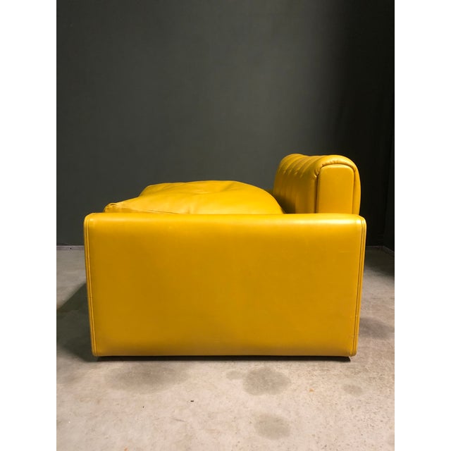 Amazing lounge chair by Luigi Massoni for Poltrona Frau. Some very light scuffing to the leather on the top edge of the...