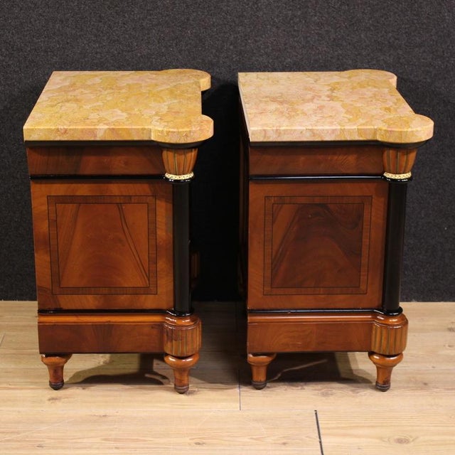 Pair of Italian bedside tables from the second half of the 20th century. Veneered and inlaid furniture in mahogany,...