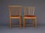 A pair of rare ash wood chairs with leather seats. Designed by in 1947 by Elmar Berkovich for the employees of Bataafsche...