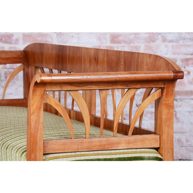This Biedermeier sofa dates back to the early 19th century and originates from Austria. It is crafted from solid cherry...