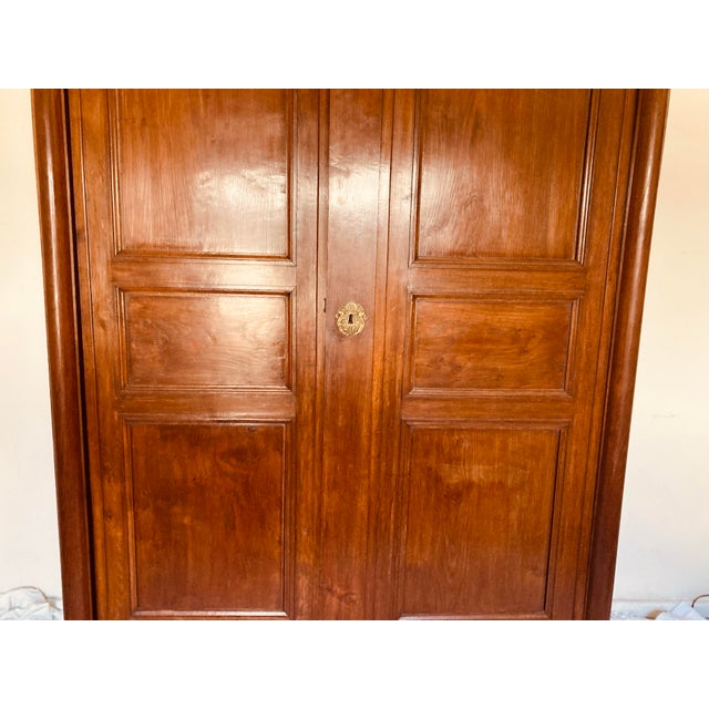 Sienna Antique French Empire Armoire Walnut, Columns to Either Side Front With Bronze Gilt Mounts Also Gilt Bronze Key Hole For Sale - Image 8 of 12