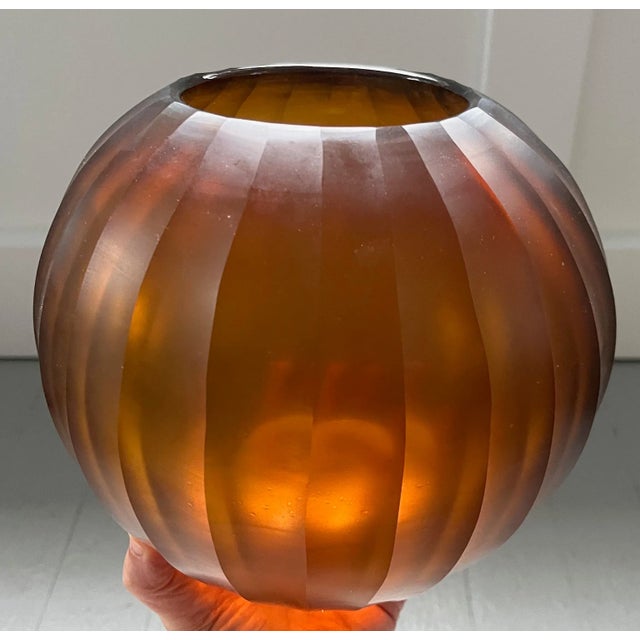 French Art Deco amber glass faceted rose bowl vase. Heavy weight with polished pontil at the base. Measures 8" diameter x...