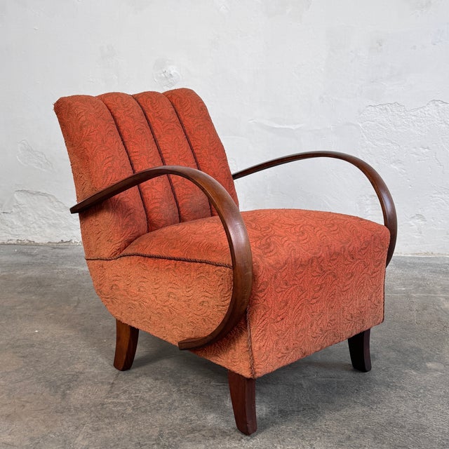 This iconic pair of h-410 armchairs was designed by the visionary architect and furniture designer jindřich halabala...