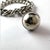 Art Deco Antique Swedish 1900's Silver Curb Chain Bracelet With Troll Ball Charm - Memory Bracelet For Sale - Image 3 of 5