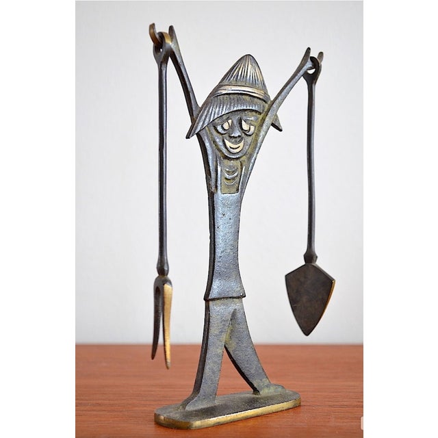 A mid-century cactus tool made of patinated brass. This decorative piece dates from the 1950s and is attributed to Walter...