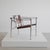 The iconic armchair uses a chrome-plated frame with back- and seat-cover upholstered in cowhide; the back can be tilted....
