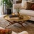 Striking vintage Moroccan brass tray table featuring a large hand-worked brass tray top set on an exceptionally sculptural...