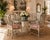 Charming set of five 1970s Palm Beach–style dining chairs featuring elegant Queen Anne–inspired silhouettes, carved wood...