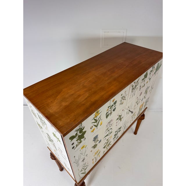 Wood 1940’s Swedish Cabinet With Nordens Flora Illustrations For Sale - Image 7 of 9