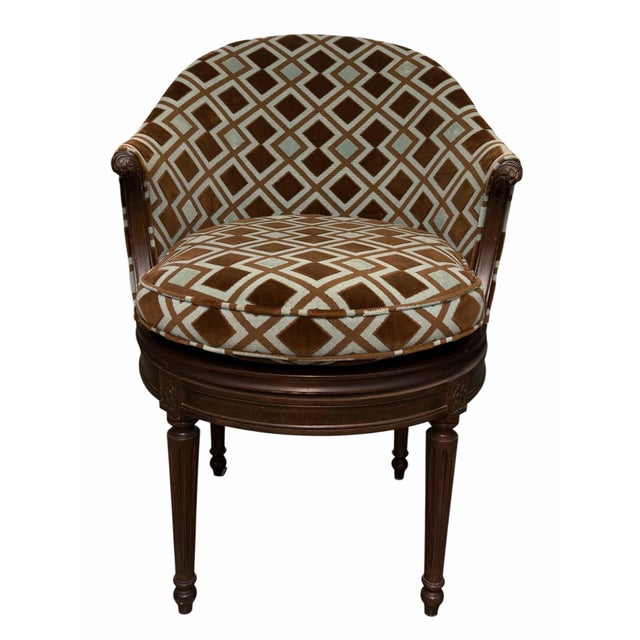 Louis XVI Style Upholstered Swivel Chair. Beautifully upholstered with a rich brown and Tiffany blue fabric.