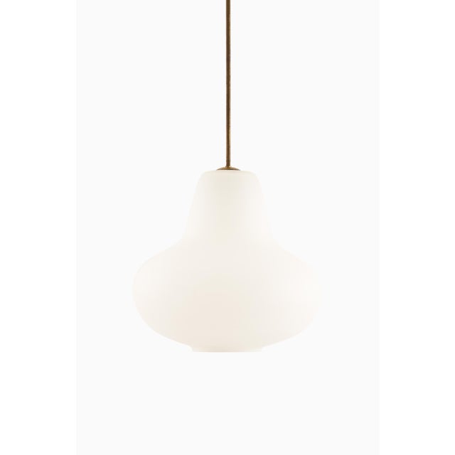 Designed by carl-axel acking and produced by asea in sweden during the 1940s, this ceiling lamp is a refined example of...