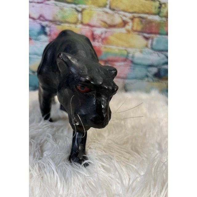 Vintage Leather Wrapped Black Panther. He is amazing! He has all of his four teeth and all of his whiskers.