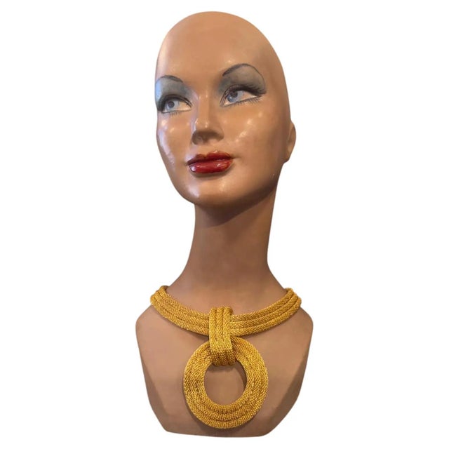 This exquisite vintage Italian choker from the 1990s serves as a masterclass in bold, architectural costume jewelry...