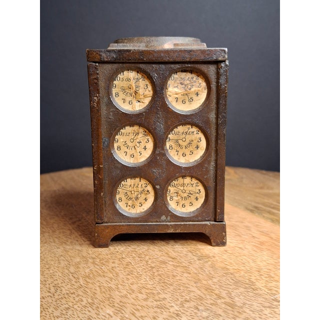 This is an exceptional, completely original early 20th-century cast iron still bank manufactured by the Arcade...