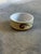 This charming studio pottery small bowl or ramekin features a speckled beige and pale yellow exterior accented by hand-...