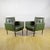 This pair of armchairs represents a vibrant example of 1970s design, a period celebrated for its bold use of color and...