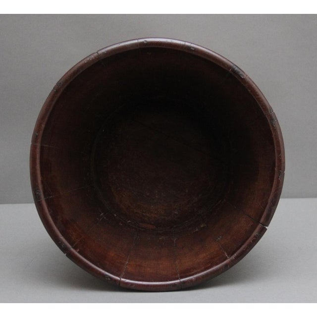 Early 19th Century mahogany brass bound backet of circular form tapering down towards the bottom, good quality bucket and...