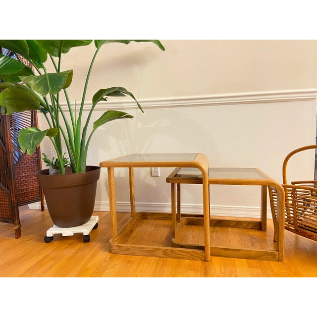 Vintage Lou Hodges Style nesting tables (set of 2) Lou Hodges Design - California 1970s. Bent oak base with inset smoked...