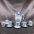 This is a blue and white chocolate pot set that includes the chocolate pot, matching lid, six cups and five saucers. But...