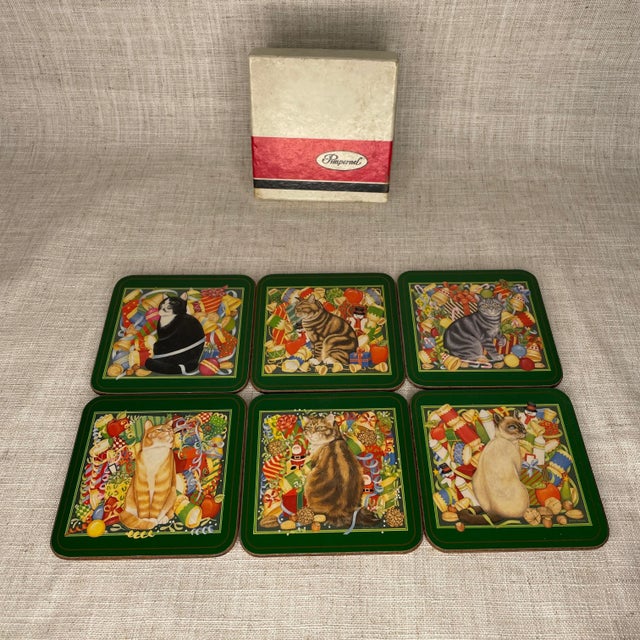 This delightful set of six Pimpernel coasters, crafted in England in the late 20th century, captures the festive spirit...