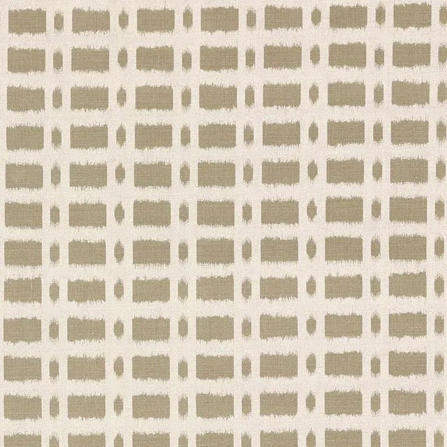 Townline Road is a handsome, graphic pattern with a loose, painterly quality. Woven in England, the natural linen ground...