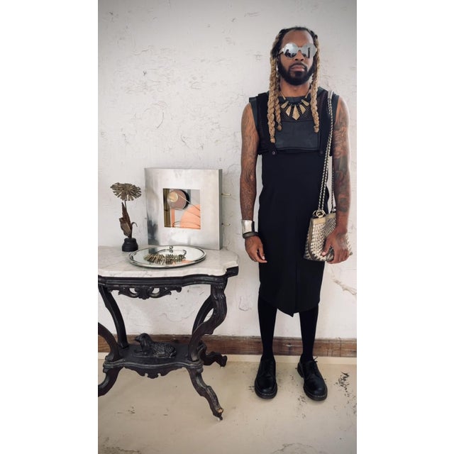 Early 2000s woven metallic handbag by Warren Reece with a tight basketweave, oversized gold tone grommets, and a long...