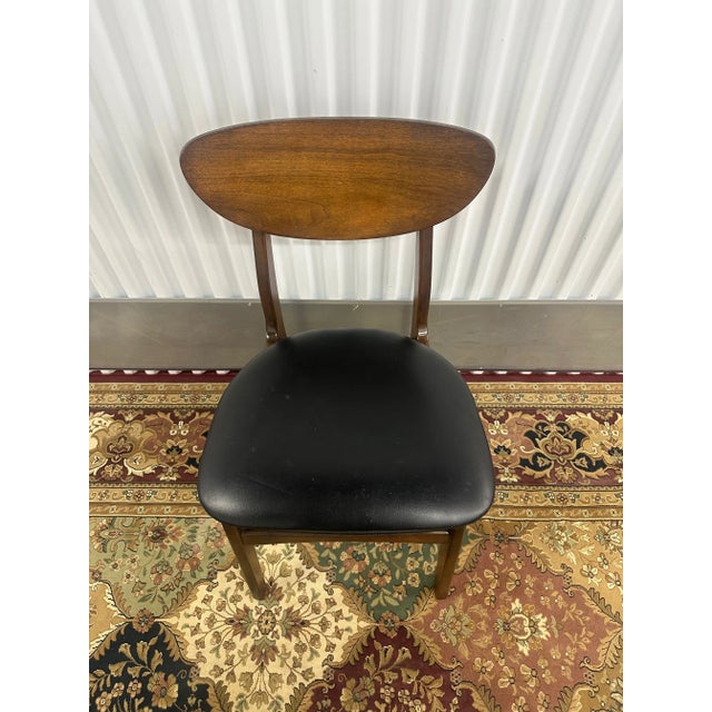 Introducing the epitome of elegance and comfort - the Victor Garrison 1960s Danish Mid Century Modern Chair with a Clam...