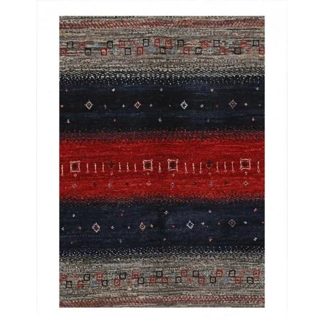 The word “Gabbeh” literally translates to “in the rough,” and it is an accurate description of this style of Persian rug....