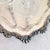 A generously sized silver plate tray by FB Rogers Silverware with a dramatic scalloped, rococo-style rim featuring raised...