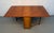 Add functional mid-century charm to your home with this Romanian Drop Leaf Hide-A-Way Table complete with four matching...