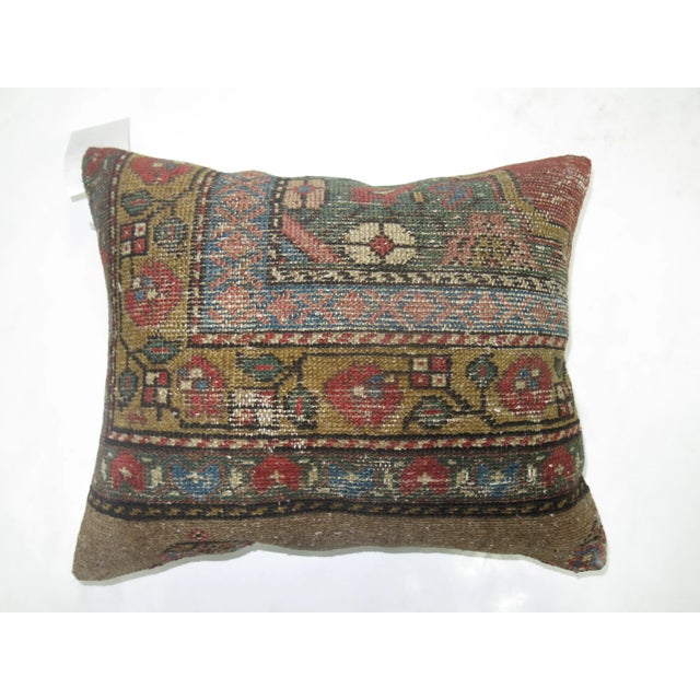 Pillow made from a 19th-century antique Camel Hair Serab rug with solid cotton back. Zipper closure. 17'' x 20" inches.