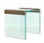 Sleek Postmodern 1980s design waterfall accent or side table with heavy tempered glass top and side panels with gilt...