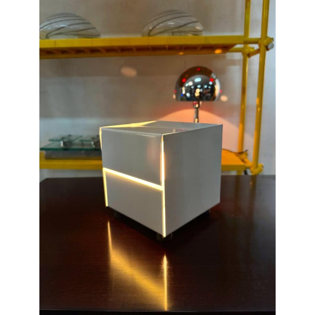 Stackable cubic lamp, published model "3h" from the "sirrah" series by paolo tilche, 1970s. white or chrome-plated metal...
