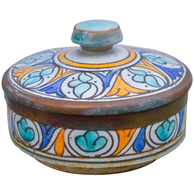 Antique handcrafted and glazed ceramic box from Fez, Morocco. Features an intricately hand-painted Moorish pattern in a...