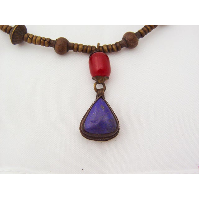 Vintage early 20th century middle eastern tribal necklace. Tear drop large lapis lazuli pendent with red carnelian bead...