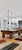 An extraordinary, architectural-grade collection of 3 matching, custom-commissioned pendant lights handcrafted by renowned...
