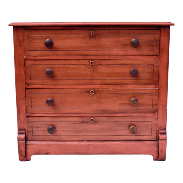 American pine chest of four Knapp dovetail drawers with original locks and working key in the cottage style boasting the...
