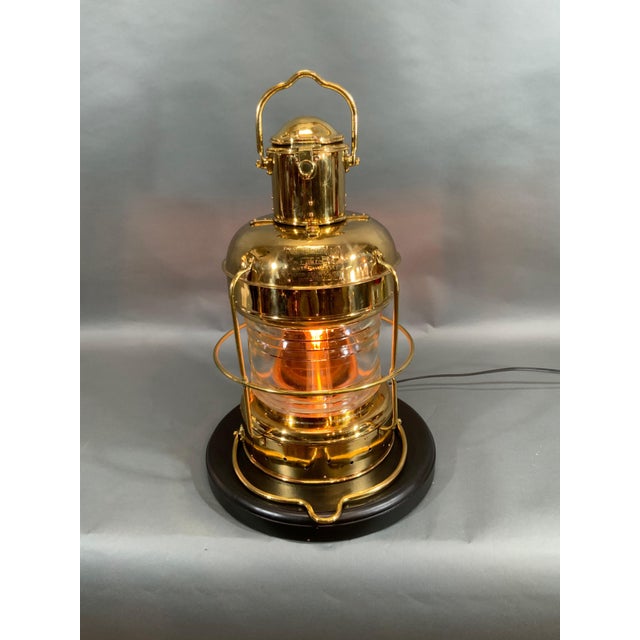 Solid brass ship's anchor lantern with glass Fresnel lens. Wired with electricity. Japanese maker's badge from by Nippon...